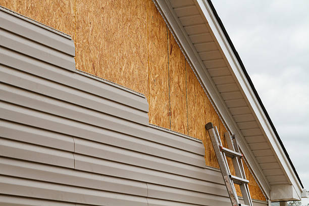 Professional Vinyl Siding technician working in Angier, NC